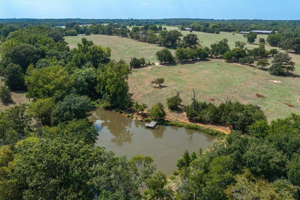 TBD Interstate 20, Lindale, TX 75706 Drone / aerial view featuring a water view and a rural view