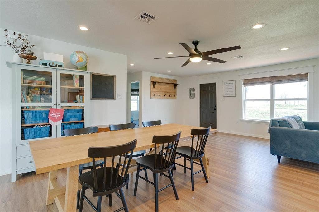 939 Twin Bends Road, Crawford, TX 76638 Dining space featuring baseboards, visible vents, recessed lighting, ceiling fan, and light wood-type flooring