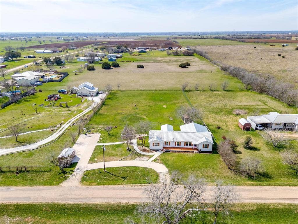 939 Twin Bends Road, Crawford, TX 76638 Aerial view featuring a rural view