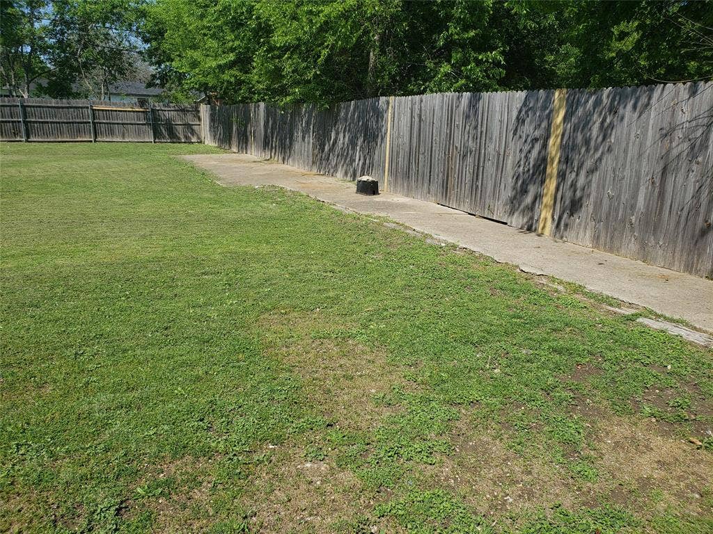 5617 Watauga Road, Watauga, TX 76148 Backyard with Fencing with sidewalk
