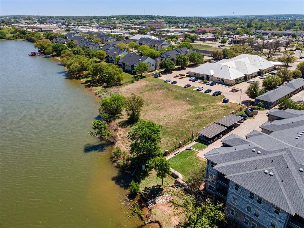 805 Hill Boulevard, Granbury, TX 76048 Aerial view featuring a water view and a residential view