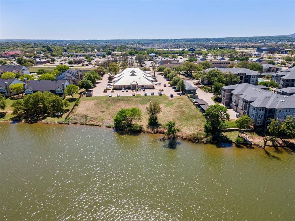805 Hill Boulevard, Granbury, TX 76048 Aerial view featuring a water view and a residential view
