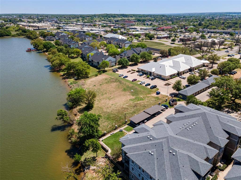 805 Hill Boulevard, Granbury, TX 76048 Bird's eye view with a water view and a residential view