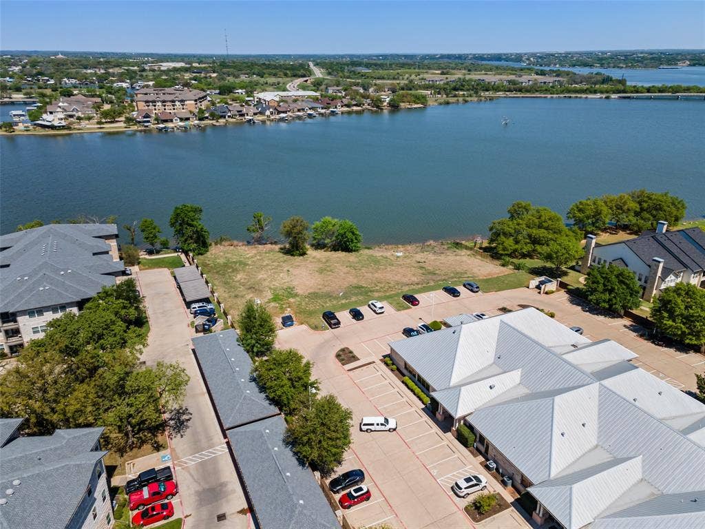 805 Hill Boulevard, Granbury, TX 76048 Birds eye view of property with a residential view and a water view