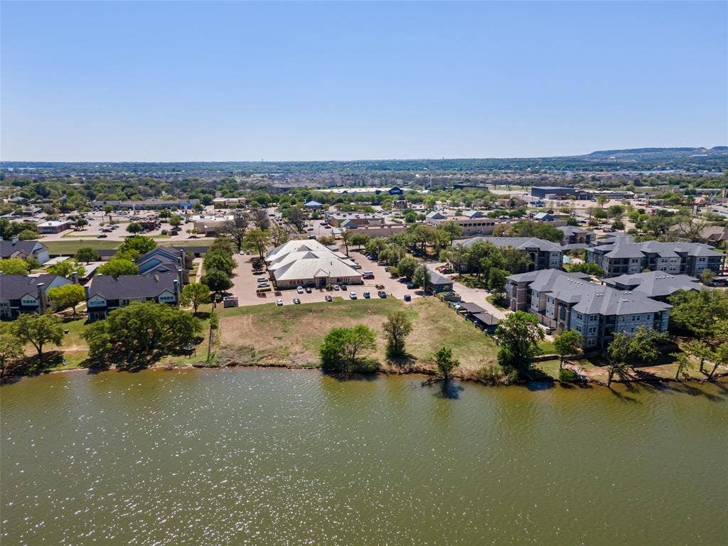805 Hill Boulevard, Granbury, TX 76048 Birds eye view of property with a water view and a residential view