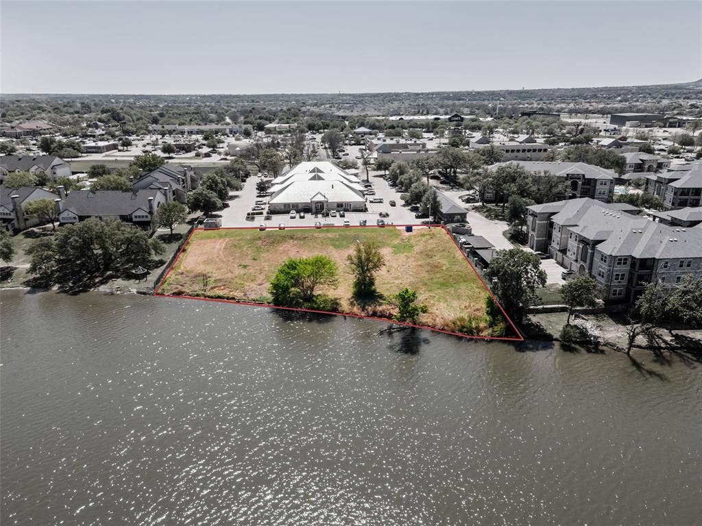 805 Hill Boulevard, Granbury, TX 76048 Birds eye view of property featuring a residential view and a water view