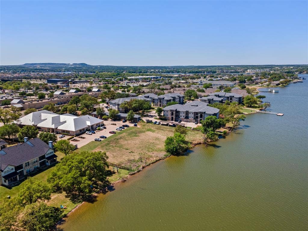 805 Hill Boulevard, Granbury, TX 76048 Birds eye view of property with a water view and a residential view