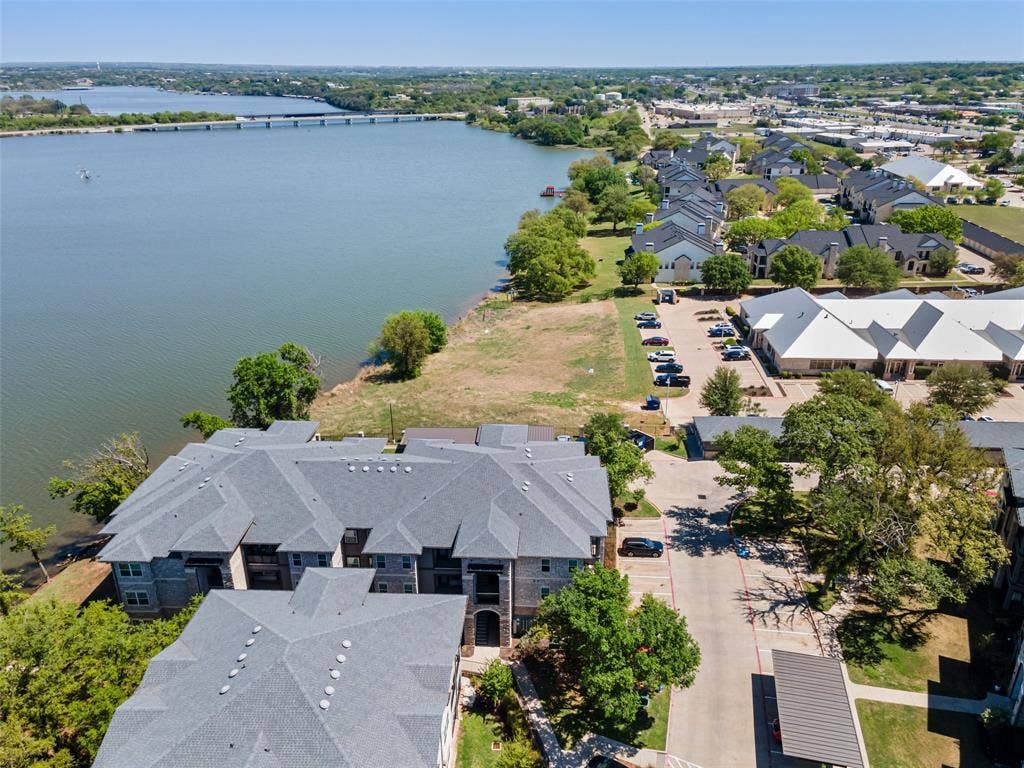 805 Hill Boulevard, Granbury, TX 76048 Aerial view featuring a residential view and a water view