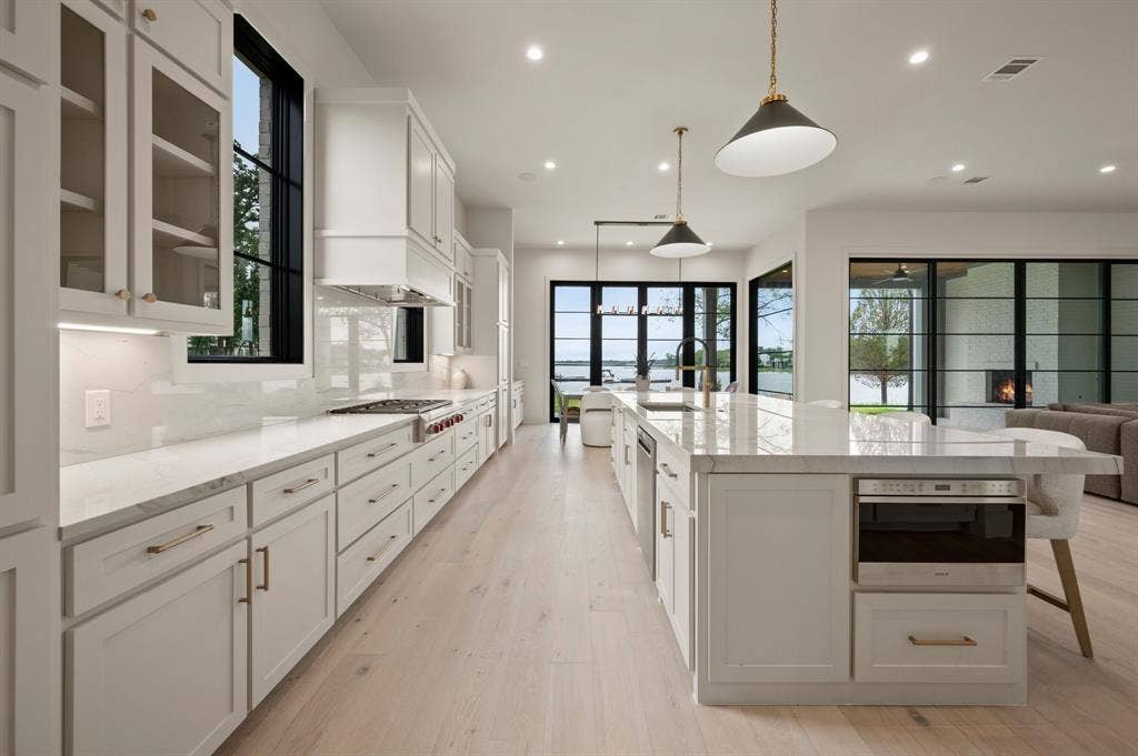 12121 Lighthouse Lane W, Malakoff, TX 75148 Kitchen with a sink, plenty of natural light, recessed lighting, appliances with stainless steel finishes, and decorative backsplash