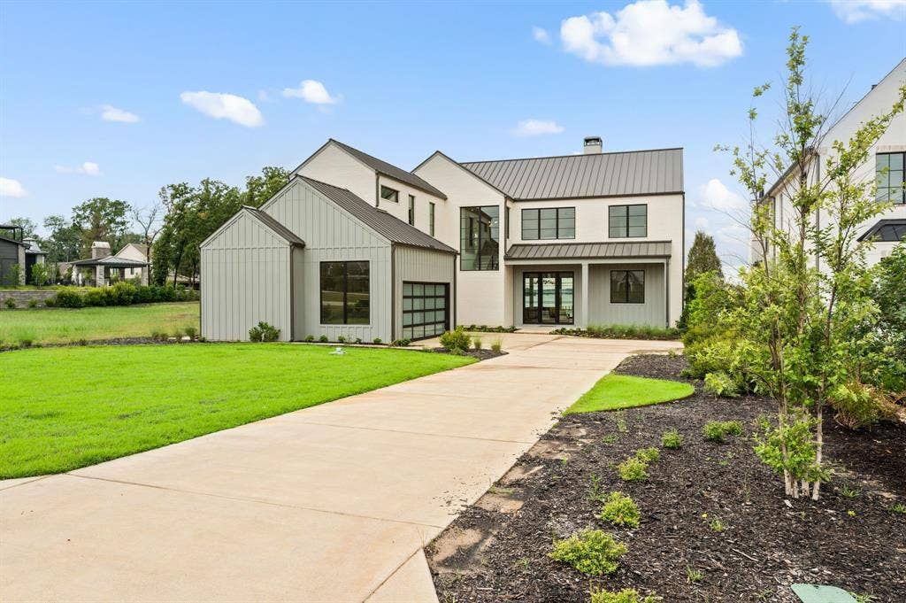 12121 Lighthouse Lane W, Malakoff, TX 75148 Modern inspired farmhouse with driveway, a front yard, board and batten siding, a chimney, and a standing seam roof