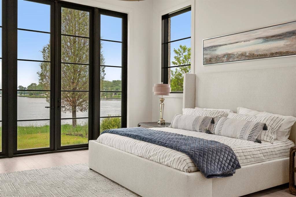 12121 Lighthouse Lane W, Malakoff, TX 75148 Bedroom featuring a water view and wood finished floors