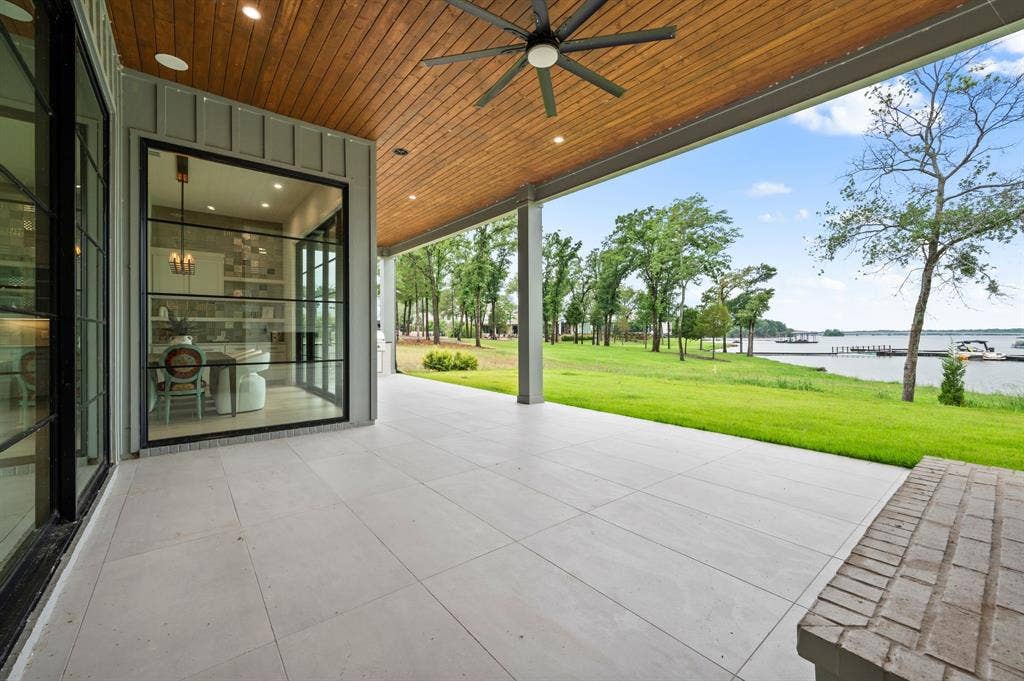12121 Lighthouse Lane W, Malakoff, TX 75148 View of patio / terrace featuring a water view and ceiling fan