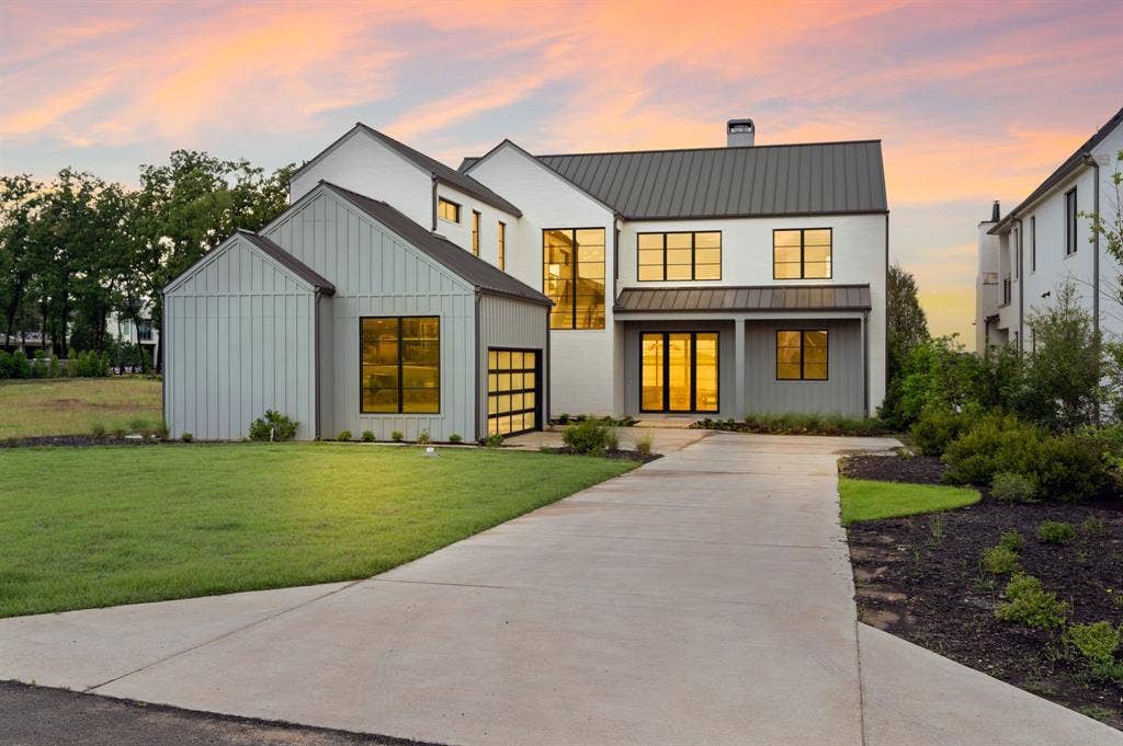 12121 Lighthouse Lane W, Malakoff, TX 75148 Modern farmhouse with a standing seam roof, concrete driveway, board and batten siding, a chimney, and a front yard