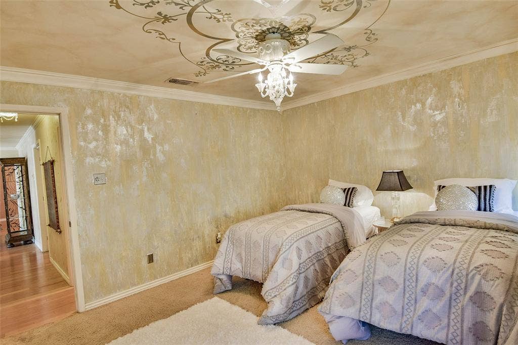 4009 Scenic Way, Granbury, TX 76049 Bedroom with baseboards, crown molding, and ceiling fan