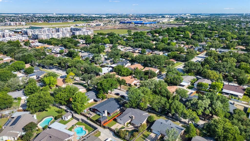 745 Oakland Street, Grand Prairie, TX 75052 Aerial view of property and surrounding area with a pool area
