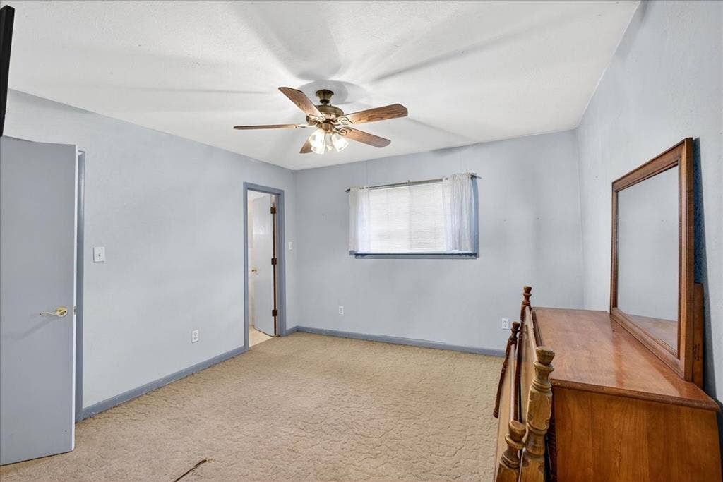 6903 Scott Street, Eustace, TX 75124 Unfurnished office with a ceiling fan and carpet