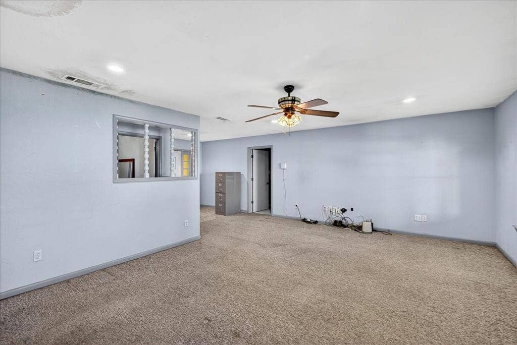 6903 Scott Street, Eustace, TX 75124 Spare room with carpet, ceiling fan, and recessed lighting