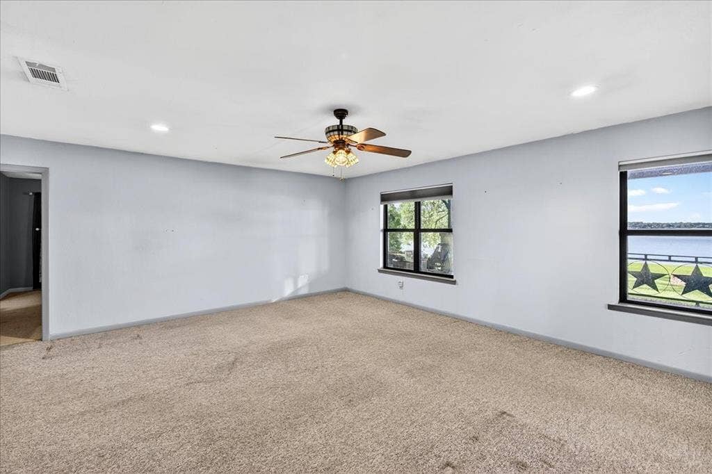 6903 Scott Street, Eustace, TX 75124 Carpeted spare room featuring ceiling fan and recessed lighting