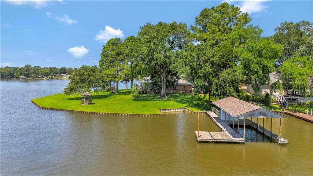 6903 Scott Street, Eustace, TX 75124 Dock area with a water view and a yard