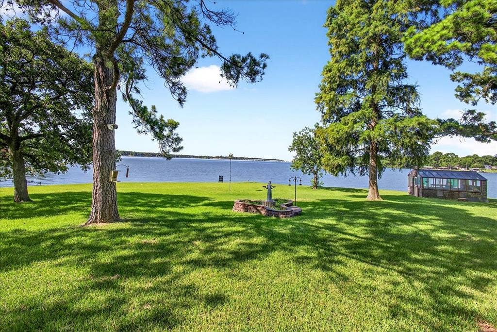 6903 Scott Street, Eustace, TX 75124 View of grassy yard with a water view