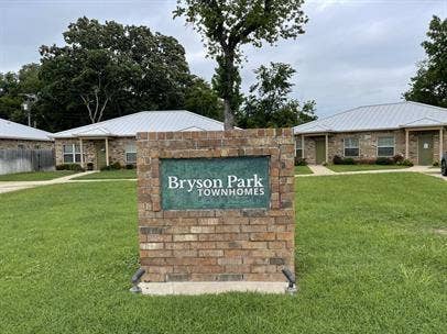 507 E Bryson Street, #A, Athens, TX 75751 Community / neighborhood sign featuring a lawn