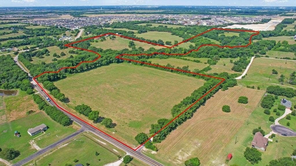 4196 County Road 1001, McKinney, TX 75071 2026 - Birds Eye View of the land and the NEW Phase of Eastridge