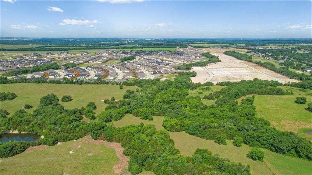 4196 County Road 1001, McKinney, TX 75071 Aerial View of the land at 4195 CR 1001 that butts up against the Subdivision - Eastridges New Phase.