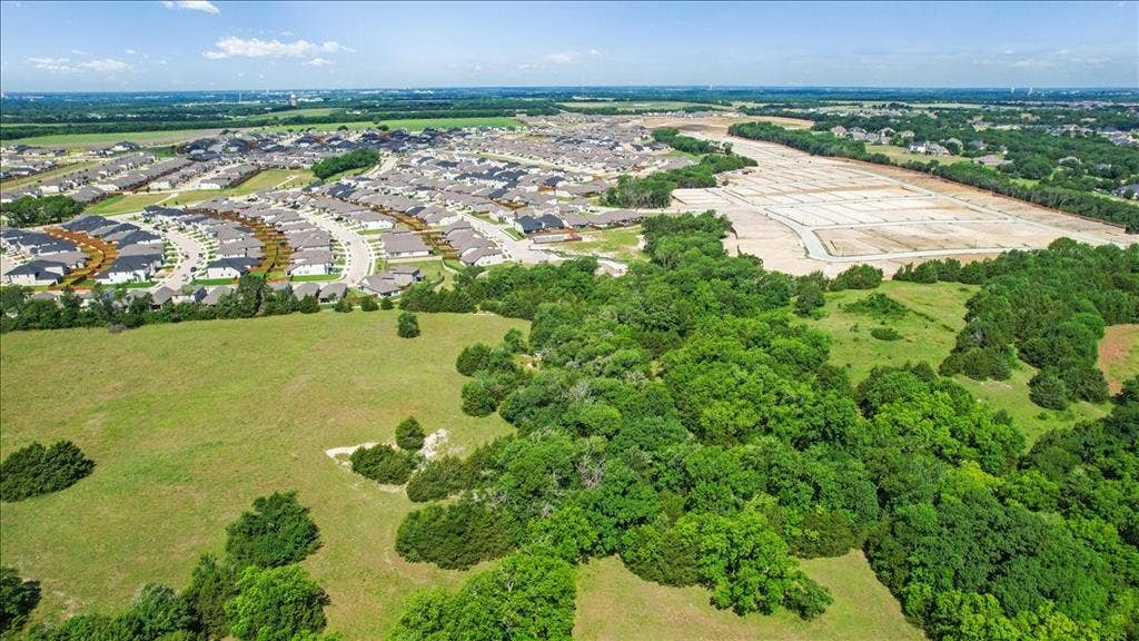 4196 County Road 1001, McKinney, TX 75071 Aerial View of the land at 4195 CR 1001 that butts up against the Subdivision - Eastridges New Phase.