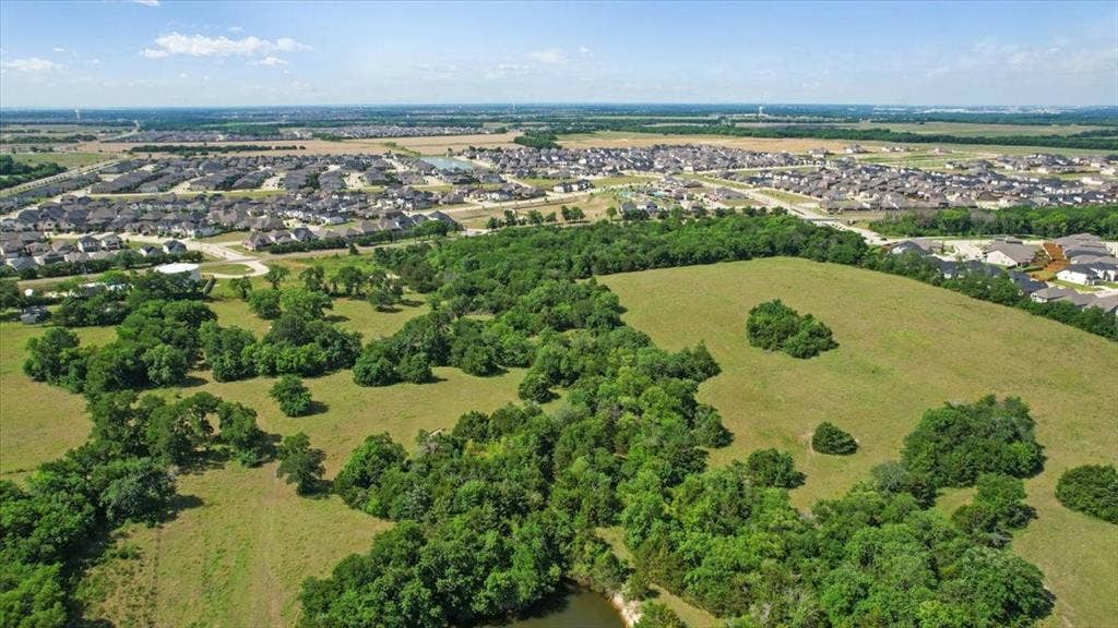 4196 County Road 1001, McKinney, TX 75071 Aerial View of the land at 4195 CR 1001 that butts up against the Eastridge Subdivision.