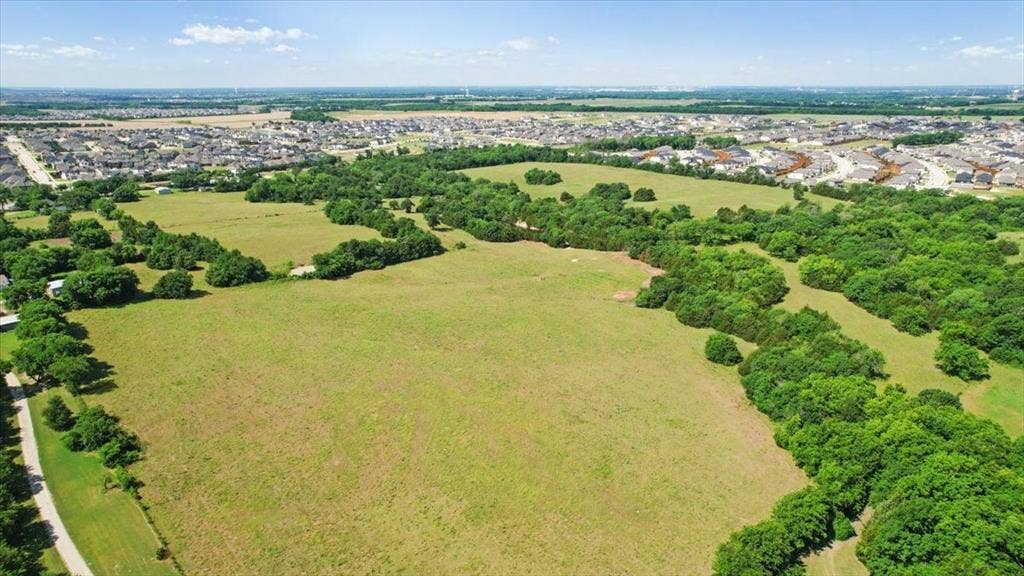 4196 County Road 1001, McKinney, TX 75071 Aerial View of the land at 4195 CR 1001 that butts up against the Eastridge Subdivision