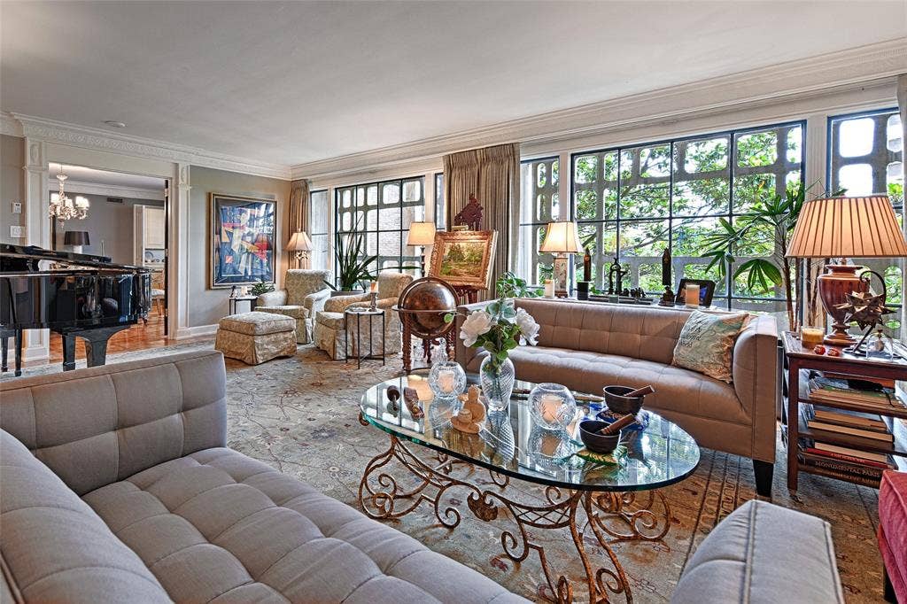 3525 Turtle Creek Boulevard, #4E, Dallas, TX 75219 Living area featuring crown molding and wood finished floors