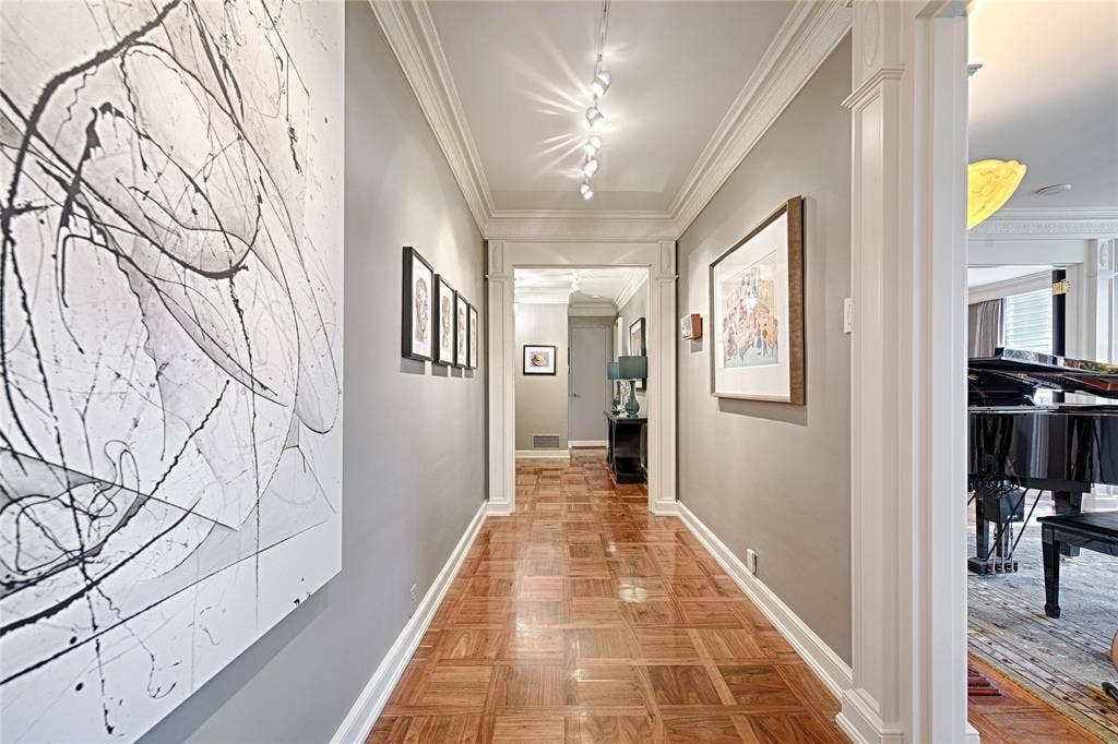 3525 Turtle Creek Boulevard, #4E, Dallas, TX 75219 Gallery looking towards the entry foyer featuring crown molding and track lighting