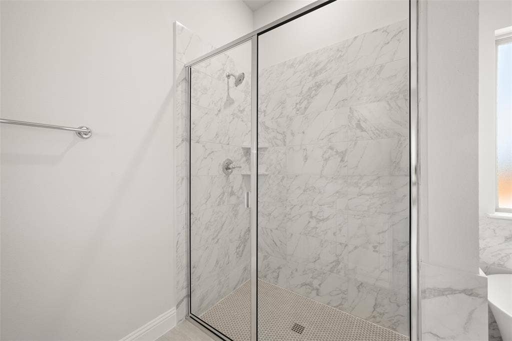 413 Wabash Drive, Waxahachie, TX 75167 Full bathroom featuring a stall shower and a freestanding tub