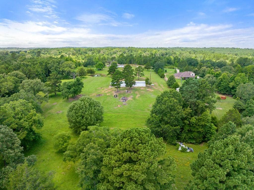 5353 CR 385, Tyler, TX 75708 View of property location with a forest