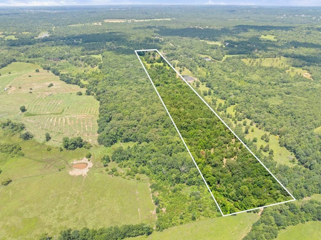 5353 CR 385, Tyler, TX 75708 Aerial view of sparsely populated area featuring property boundaries highlighted