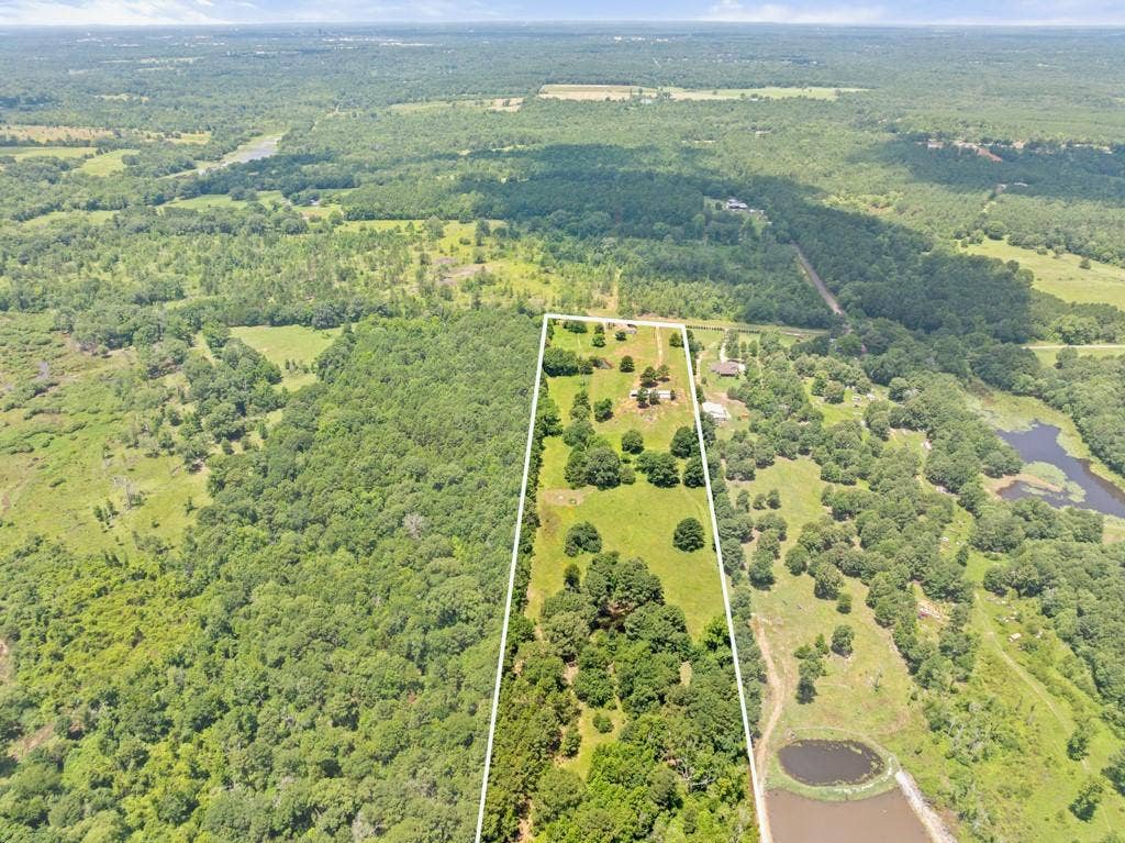 5353 CR 385, Tyler, TX 75708 Aerial view of property's location featuring property parcel outlined and a nearby body of water