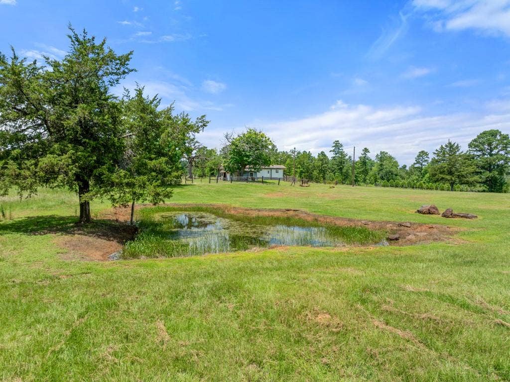 5353 CR 385, Tyler, TX 75708 View of green lawn with a water view
