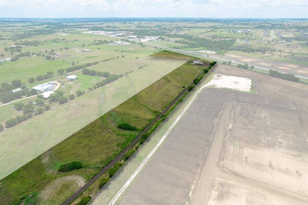 1032 #2 E Godley Avenue, Godley, TX 76044 Aerial view of property and surrounding area featuring rural landscape