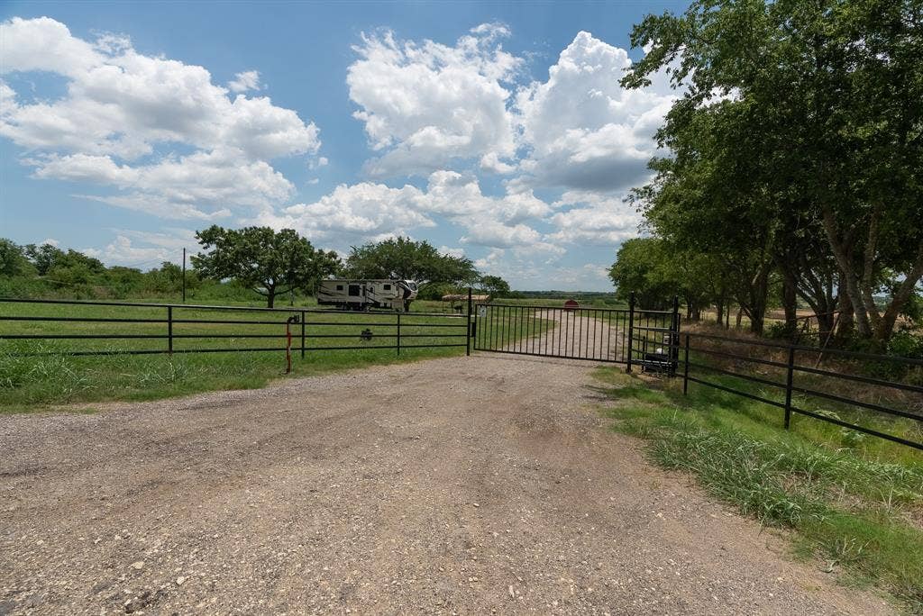 1032 #2 E Godley Avenue, Godley, TX 76044 Gate featuring a view of rural / pastoral area