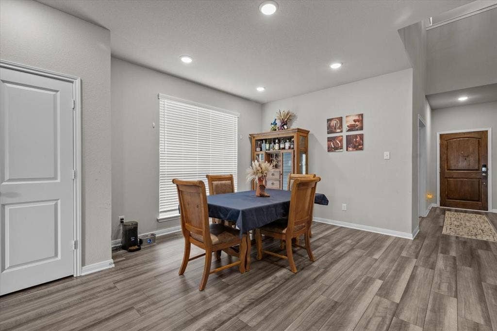 3501 Beutel Road, Waco, TX 76655 Dining room with recessed lighting and wood finished floors