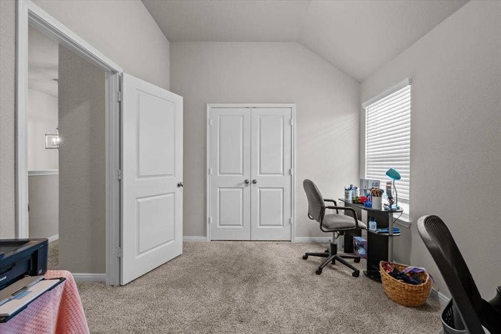 3501 Beutel Road, Waco, TX 76655 Carpeted home office featuring vaulted ceiling and baseboards