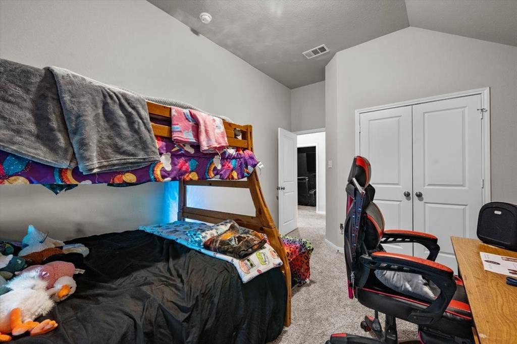 3501 Beutel Road, Waco, TX 76655 Bedroom featuring carpet and a closet