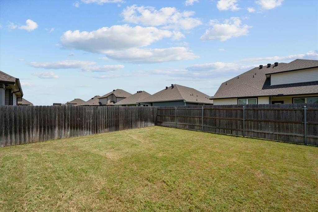 3501 Beutel Road, Waco, TX 76655 Fenced backyard with a residential view