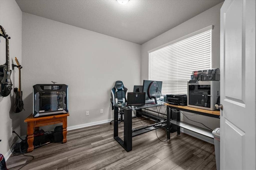 3501 Beutel Road, Waco, TX 76655 Office area with wood finished floors and baseboards