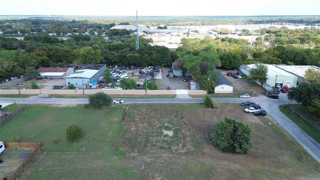 3733 Kolloch Drive, Dallas, TX 75216 Drone / aerial view of a tree filled landscape