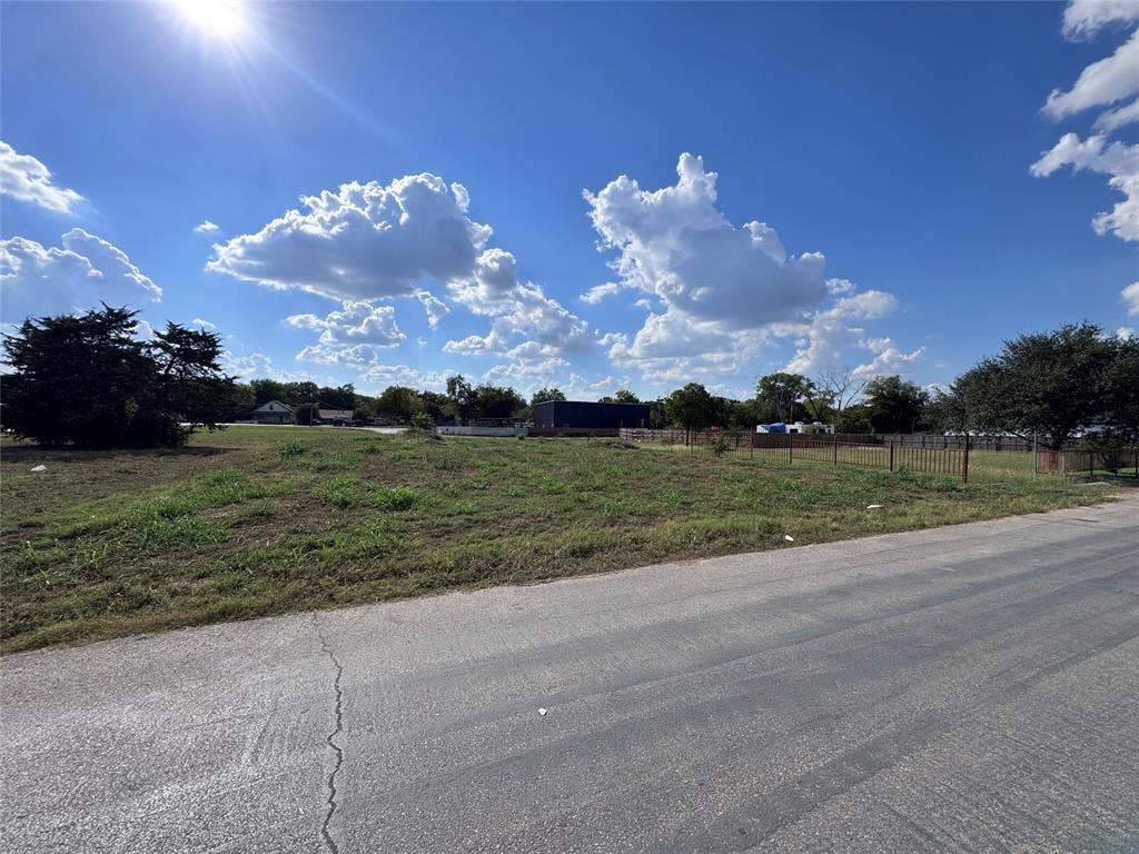 3733 Kolloch Drive, Dallas, TX 75216 View of asphalt road featuring a view of countryside