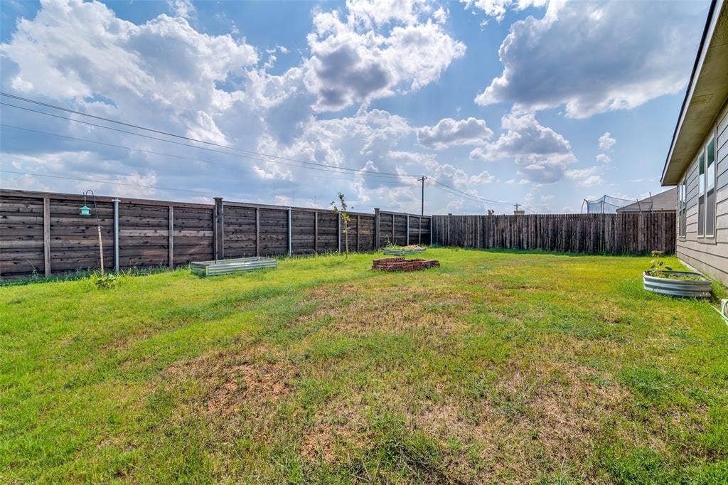 Yard ready for you - play or garden.