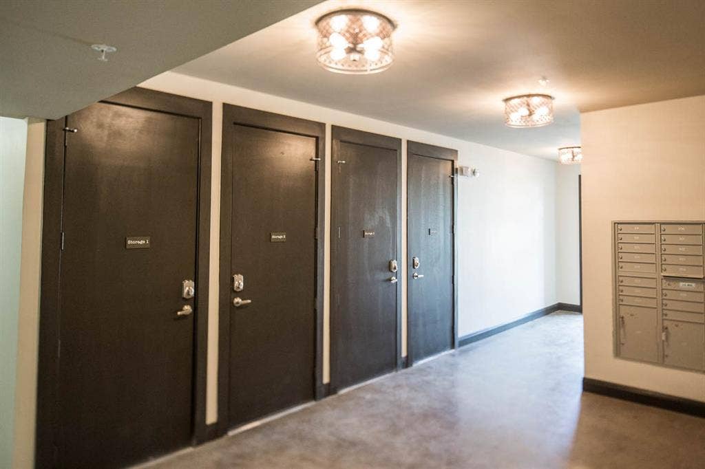 908 N Bishop Avenue, #2-103, Dallas, TX 75208 Hallway with concrete floors and mail area