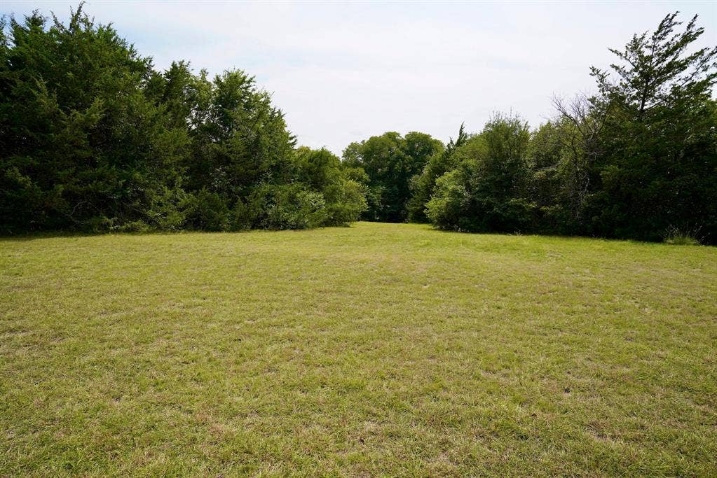 245 Oak Hill Court, Waxahachie, TX 75167 View of grassy yard