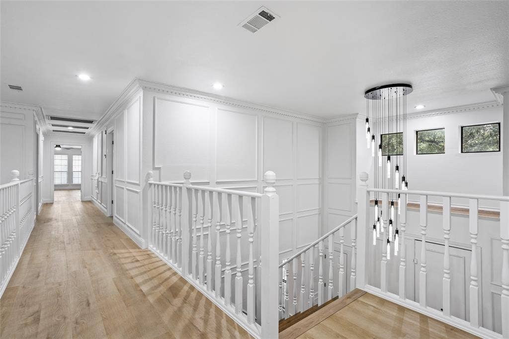 Upstairs living: 3 bedrooms, 2 full baths, bonus living or game room - also perfect for homeschoolers
